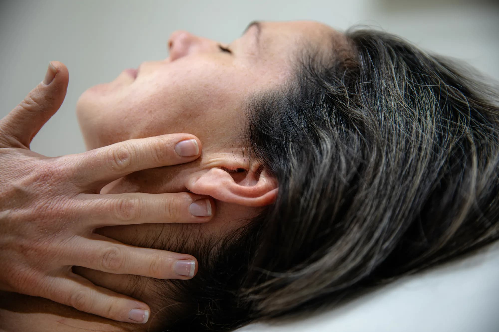 Lymphatic facial massage along the jaw and neck at Classic Skin in Echuca